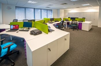 Office with pops of colour on desks