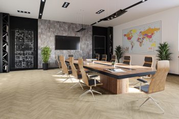 Eleganza LVT Short Plank - Vanilla Oak in a boardroom, wood matching table and chairs
